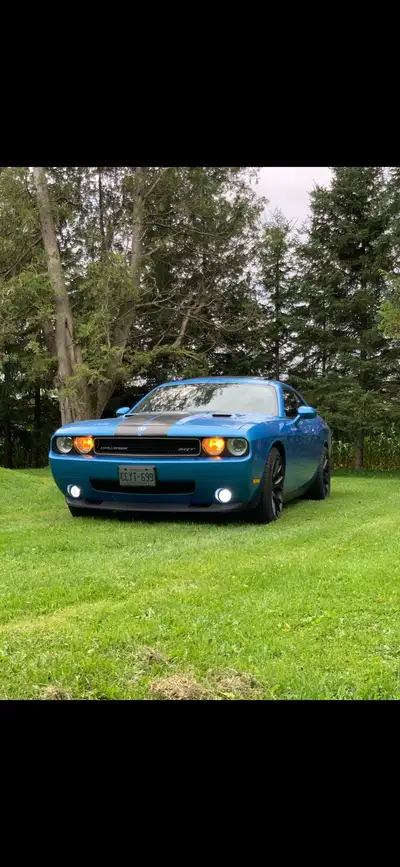 SRT8 challenger has 145000kms 6.1 Hemi 6 speed manual has Barton short throw shifter cammed and tune...