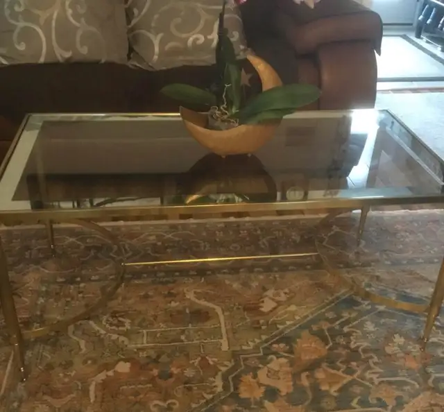 Gold coffee table with glass top L 39” X H 18” X D 19.5”63782599614721123