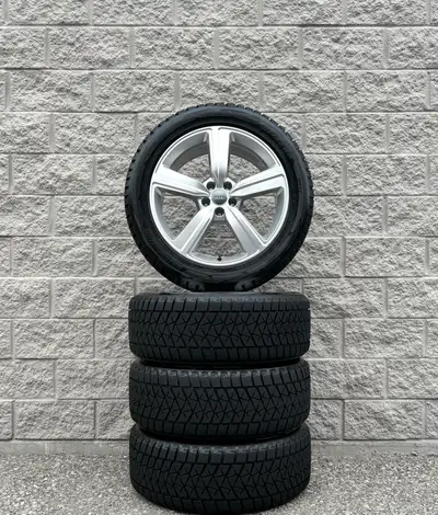 Bridgestone Blizzak DM-V2 Snow Tires and original 20 inch Audi Q8 ETron Sportback Silver Rims. Good...