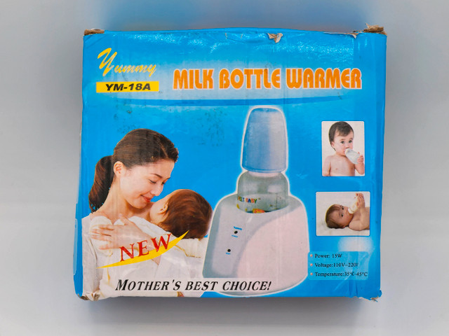 Yummy milk bottle warmer 5.5cm 2" 1/4 used/chauffe biberon usagé dans Nourriture et chaises hautes  à Ouest de l’Île - Image 2