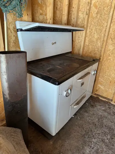 Cook stove is in really good condition. The pictures show marks but it just needs shined up. Has bee...
