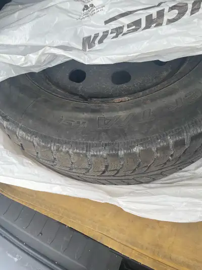 I'm selling a set of BFGoodrich Winter T/A tires, size 225/65R17, mounted on rims. These tires are u...