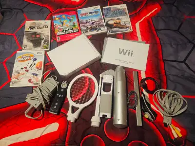 Nintendo Wii with games & accessories, View more