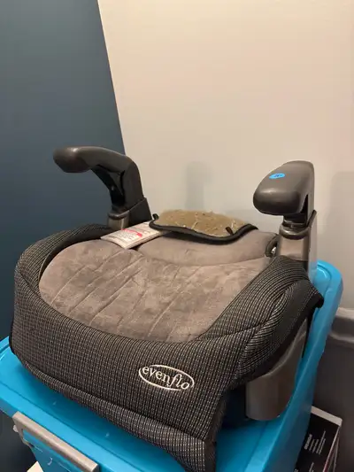 Even flo booster seat With drink holder Movable arm rests Pick up in A burg. N/S home