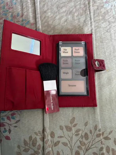 Red leather mak up case Elizabeth Arden, View more