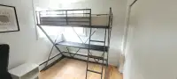 Bunk bed with table board