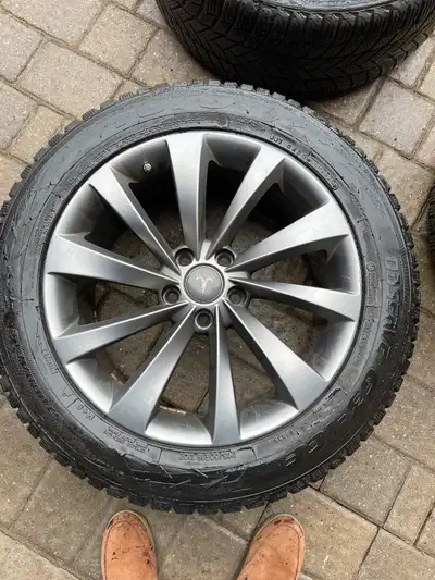 Selling set of four snow tires , wheels with TPMS installed. They were used on Tesla model X . Tire...