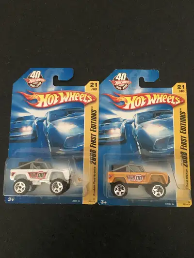 Will consider trades cards are a little ruff Both for $12 both colour variations from the same year