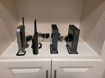 Selling the following wireless routers and wifi range extenders in good working condition: 1. Netgea...