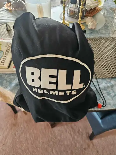 Mint condition. Full face shield. Size Medium. Snell