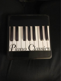 New Tin with collection of 4 CD’s with piano music. Pine RidgeNE