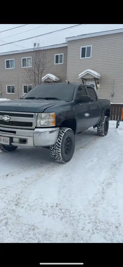 2012 Chevy Silverado for sale 2000$ obo or trade. Truck has a 3” body lift on 33s with wheel spacers...