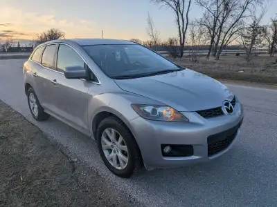 Fresh safety Low km Zero rust AWD Fully loaded Great gas mileage Spacious and luxurious Suv MAZDA CX...