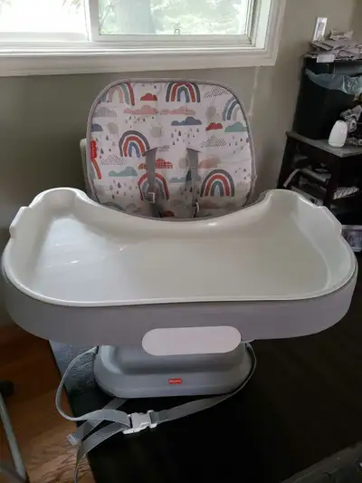 Fisher price space saver highchair Used a few times at grandmas like new $40 Booster high chair $10...