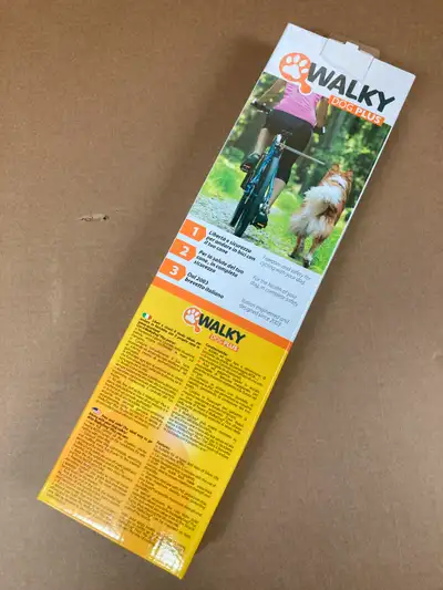 Leash attachment for walking/running dog beside bicycle. Previously mounted to a bicycle but never u...