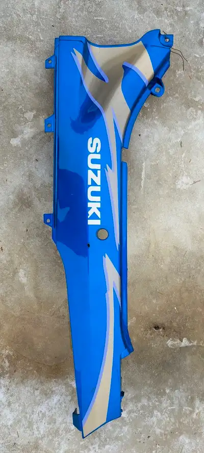 Used OEM Suzuki Left Side Panel for Katana GSX750F 1992 at Goob's Used Powersports. Part #47211-20C0...