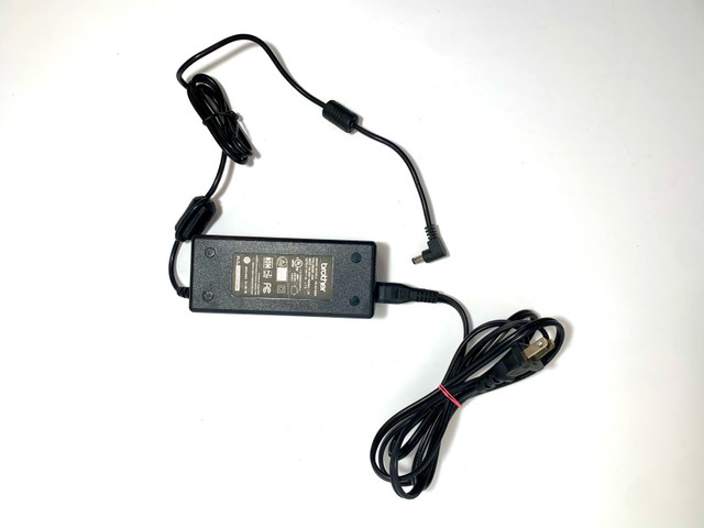 Brother power supply - PA AD 600A in Cables & Connectors in Mississauga / Peel Region