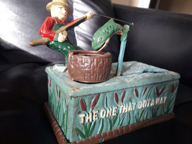 Cast Iron Fisherman Mechanical Coin Bank, "The One That Got Away in Arts & Collectibles in St. Catharines - Image 3