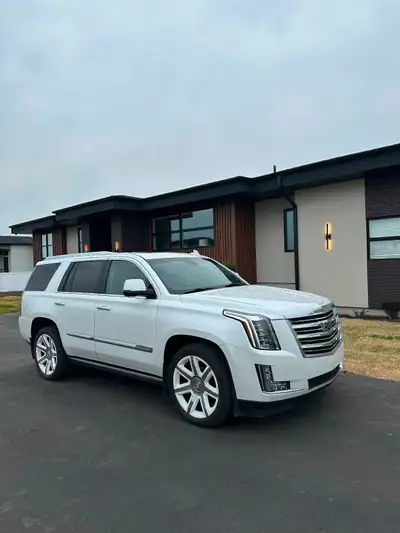 Very well maintained Escalade, ALL highway kms. new tires and new windshield, new brakes all around....