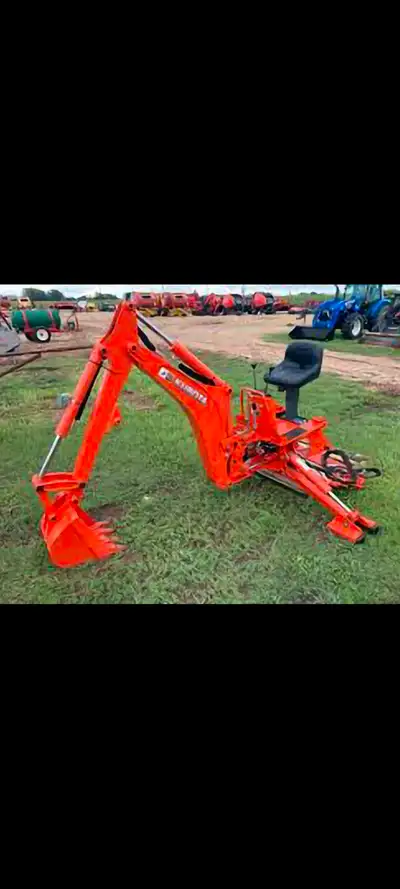 Kubota BH 77 Backhoe Attachment with 16 inch bucket and Mechanical Thumb. years old hardly used. Can...