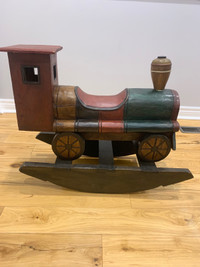 Vintage hand-carved wooden child rocking train 