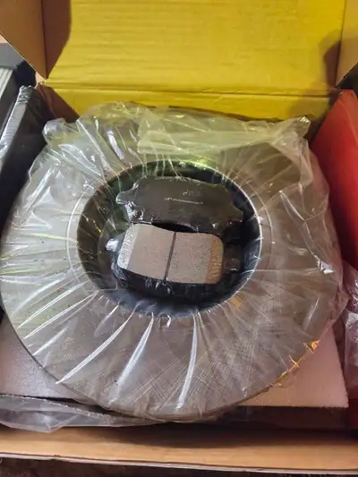 New front rotors and pads for 2008 Pontiac. G6.