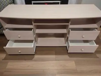 Cabinet with 4 drawers and 4 shelf in good condition. Size 68.5x22x28.5 inches.