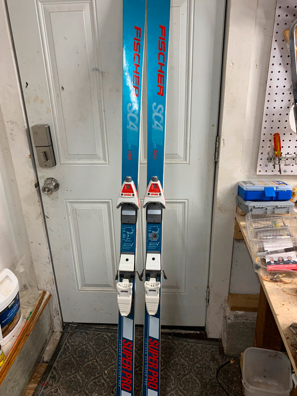 FISHER Skis and ski boots in good condition. in Ski in Winnipeg - Image 2