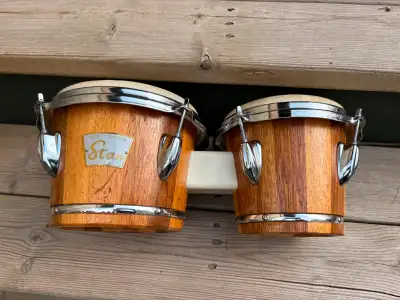 Latin American bongos from the early 1970's. Two-tone wood. Lacquer finish and calf heads. Original...