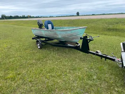 I'm selling my used aluminum boat, which includes a trailer and motor, perfect for a quick getaway o...