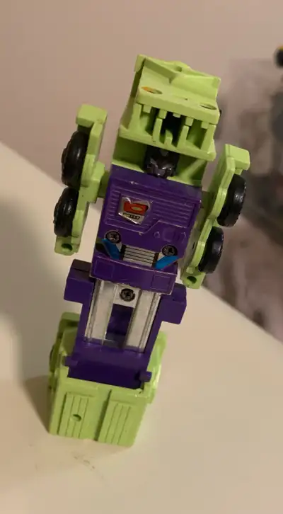 Vintage Transformers Mixmaster figure, part of the Constructicons. This Decepticon is in used condit...