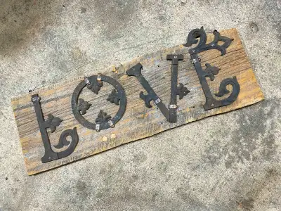 Love sign for sale. The letters are made from an old widows walk. The barn board back is 33 3/8 inch...