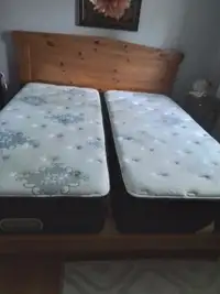 Free two super single mattresses.