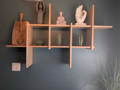 Modern Grid Shelf – pre finished Birch This sculptural wall-mounted shelf is CNC-cut from ¾" cabinet...