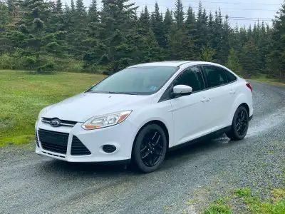 2013 Ford Focus. New safety inspected. Good until July 2028. New muffler, alternator, and battery. H...