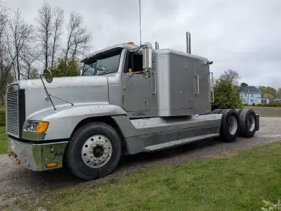 Used to haul grain from farm to nearby grain elevator. Has a great low gear to start in soft fields,...