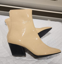 High end designer patent leather boots