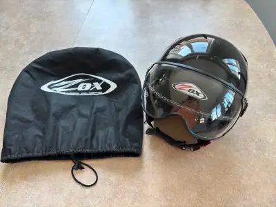 Black Zox motorcycle helmet with visor, size medium in good condition. Pick up in Blumenort evenings...