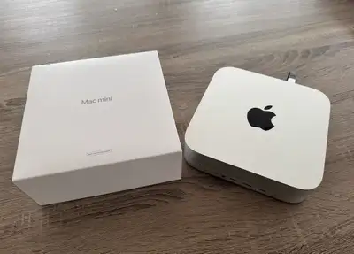 Mac mini en très bon état, vendu avec un support Satechi en aluminium. Le support ajoute plusieurs p...