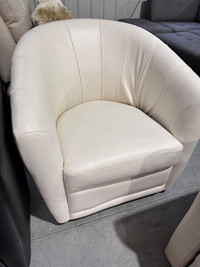 Cream Natuzzi leather swivel chair 