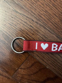 Lost massive red keychain that says bacon
