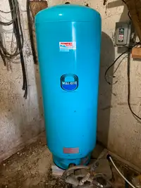 Réservoir de puit à pression verticale