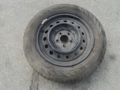 1 Continental all season tire with is for sale. Tire is 215/60/16, 90% tread left. Rims are 5 holes,...