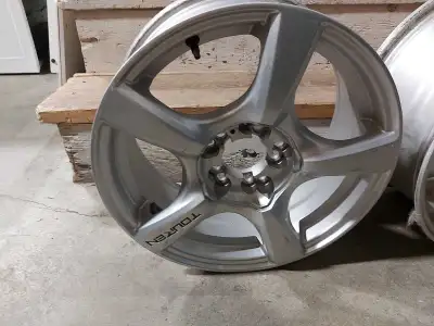 Selling a set of Tourken rims, sized 17 inches, with a 5x114.3 bolt pattern, ready to enhance your v...