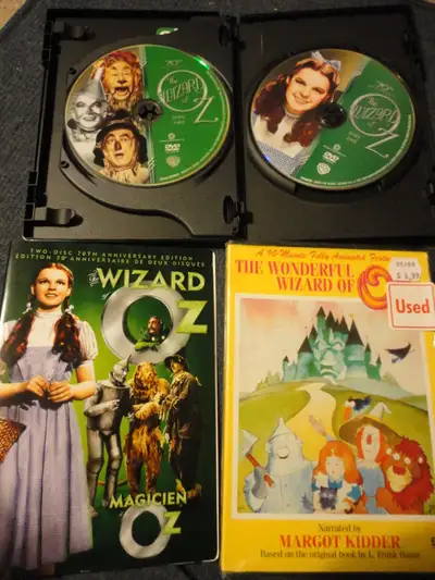 Wizard of OZ or x files collecxtions$20eTrade4bike iphone ipad, View more