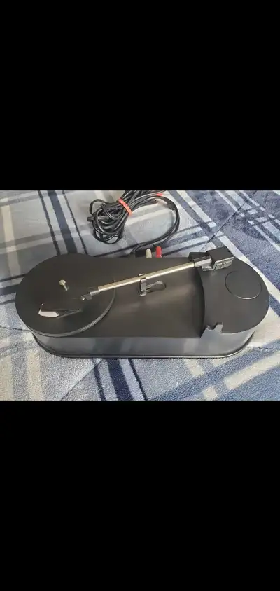 Small portable turntable with built-in phono preamp( no Amplifier needed) and is perfect for enjoyin...