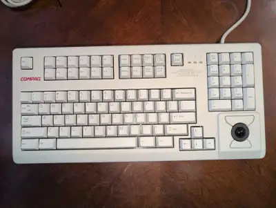 Compaq Mechanical Keyboard. Model: MX11800 Switch Style: Brown P2S connectors. Comes with USB adapte...