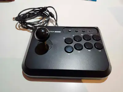 Selling Hori FIghting Stick Mini 4 for playstation 3 & 4. Works with PC too. Box is a bit old but co...