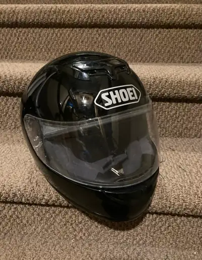 This Shoei TZR motorcycle helmet is DOT Shell Approved and in used condition, perfect for riders see...