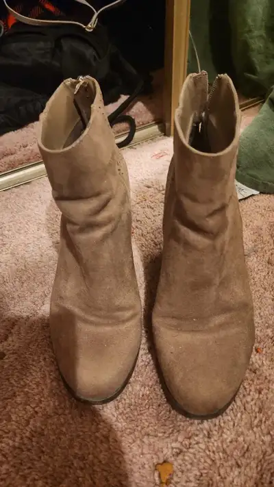 Steve Madden Tan Boots, with the zipper on the back of the foot, right above the heel. They've been...